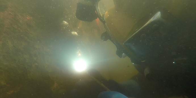 Underwater welding, commercial diving, marine construction, dock construction, barge terminal repairs