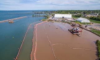 Brennan working Ashland MGP site with turbidity curtain