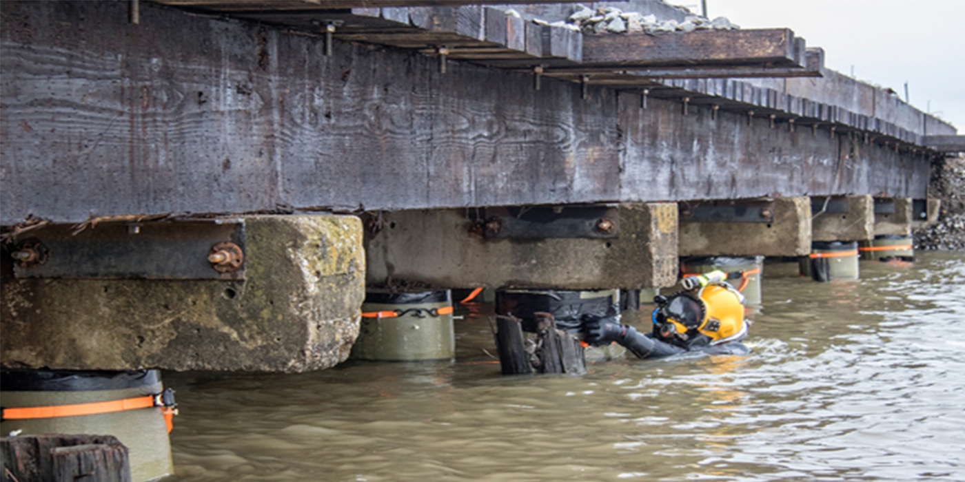 J.F. Brennan commercial diver performs thorough underwater inspection.