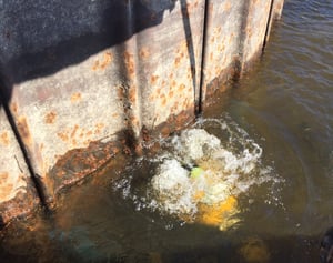 A Brennan diver investigates stray current corrosion.