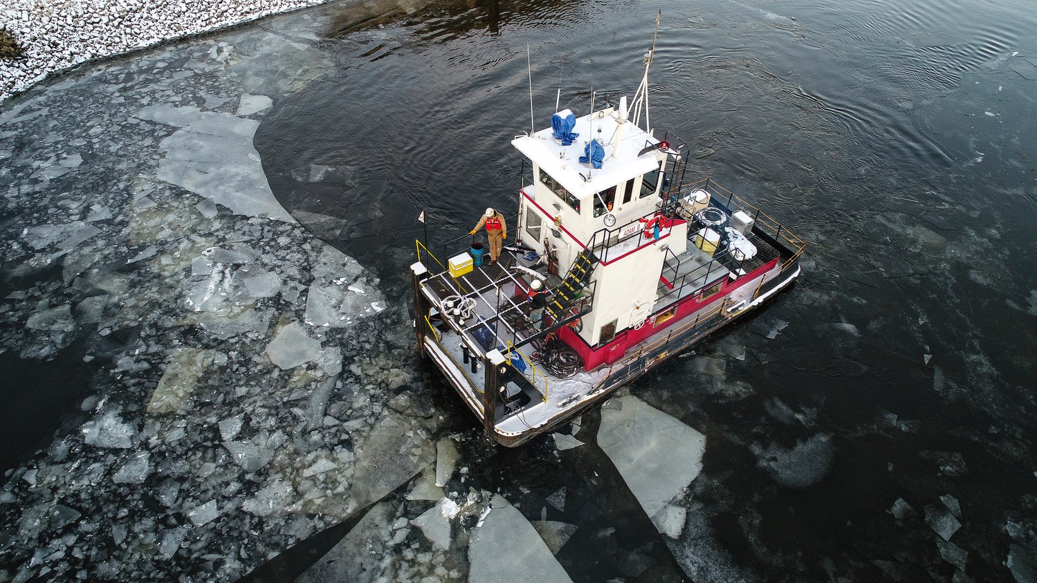 Brennan's team travels in an ice filled waterway