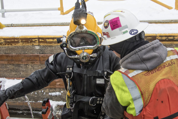 Close up of Brennan diver and safety team