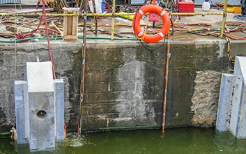 dam construction, dam repairs, concrete repairs, precast components, hydroelectric dams, hydro dams, precast concrete placement, underwater construction