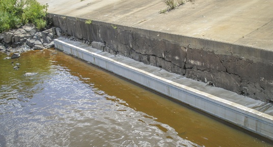 vinyl sheet piling, leave in place formwork, concrete protection, dam construction, dam repairs, midwest dam repairs, dam contractors
