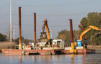 Broadcast capping system, environmental capping, sediment capping, sand covers, insitu capping, subaqueous capping