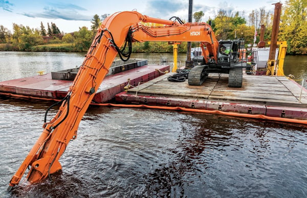 J.F. Brennan excavator on water