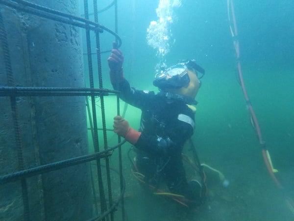 Brennan commercial diver inspecting underwater structures