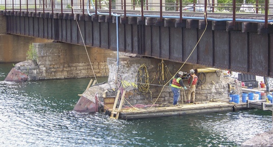 railroad pier repairs, railroad bridge construction, railroad pier construction, railroad bridge repairs, pier and abutment repairs