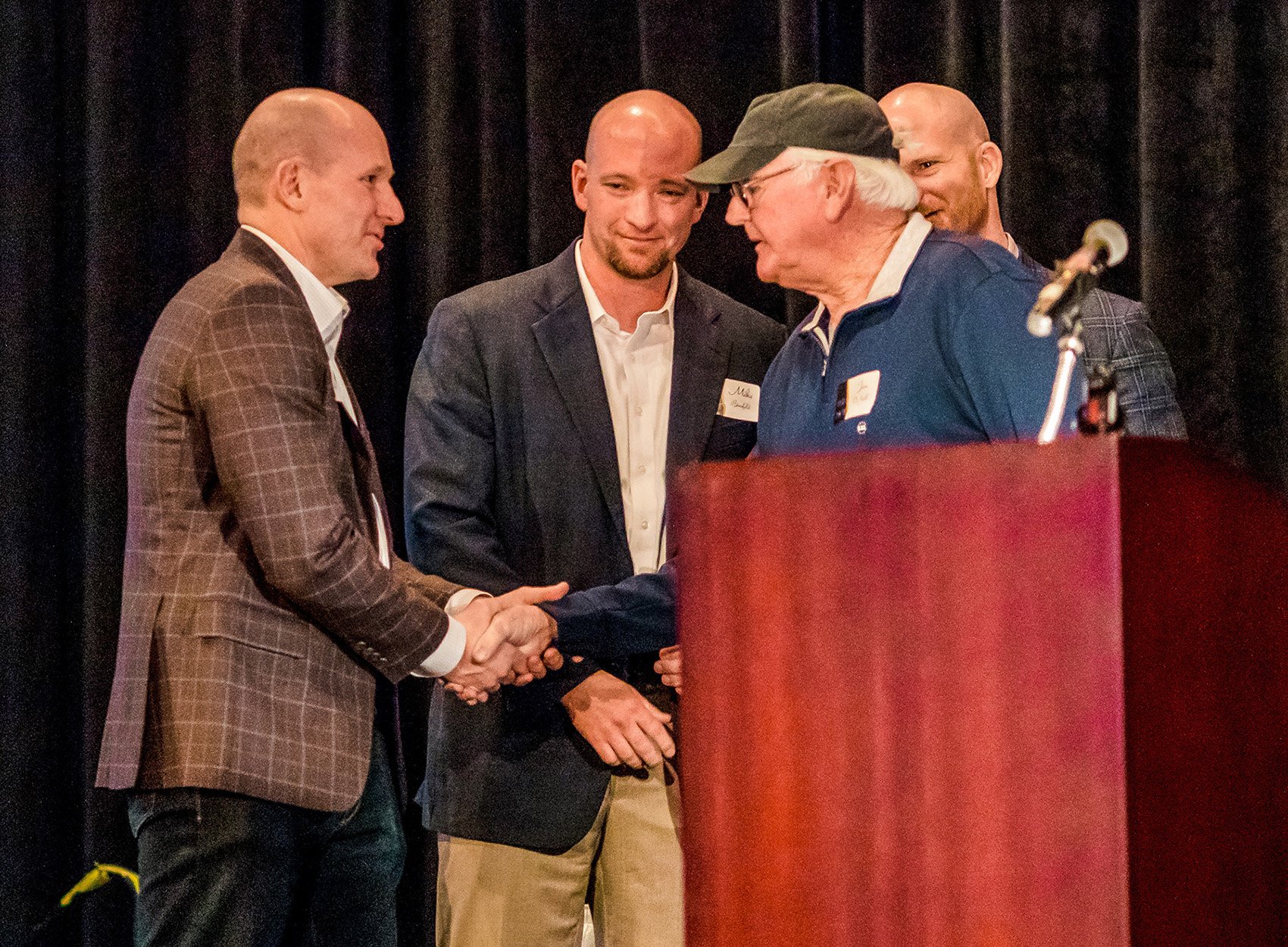 Resized 2019 Brennan 100th Anniversary_Matt Binsfeld, Mike Binsfeld, Jim ONeill, and Adam Binsfeld