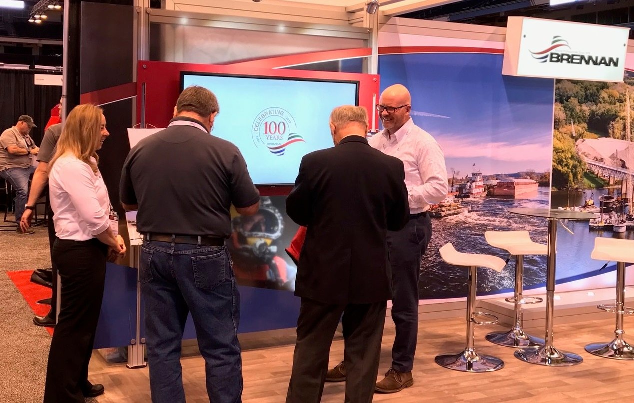 Brennan greets clients at the Inland Marine Expo (IMX 2019)