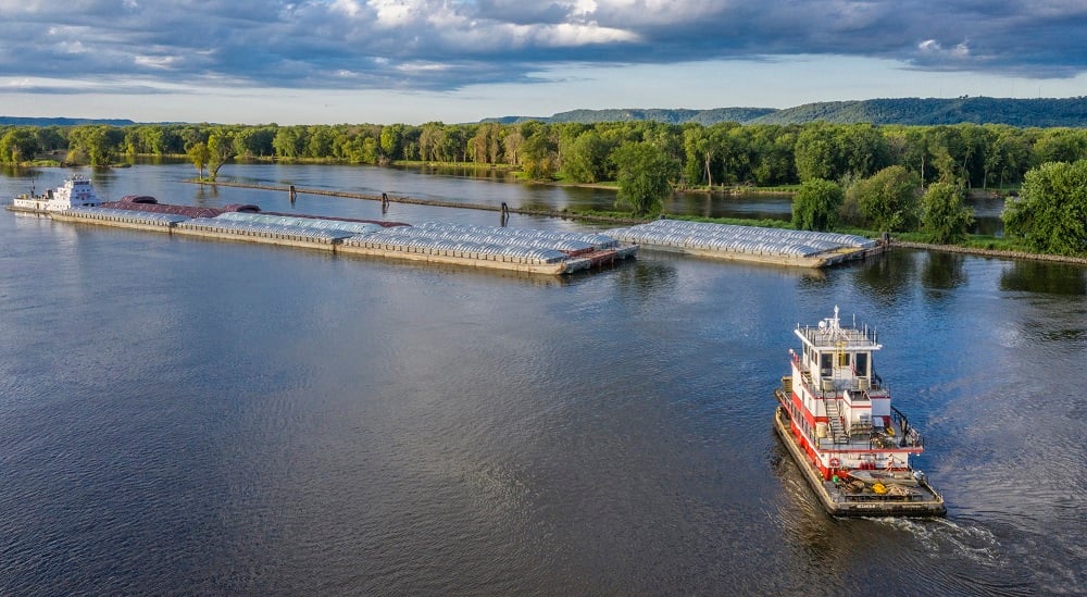 Blog Header Brennan Marine Moving Barges on River