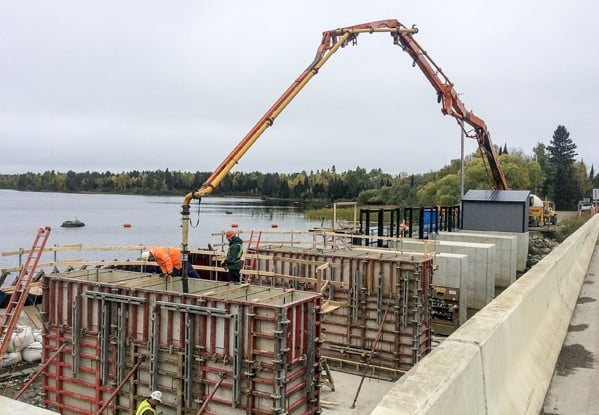 dam construction, concrete placement, mass pours, preplaced aggregate concrete