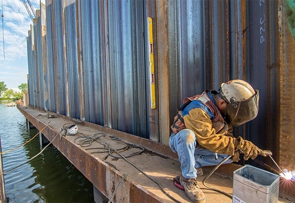 Environmental, isolation barriers, environmental dredging, containment walls