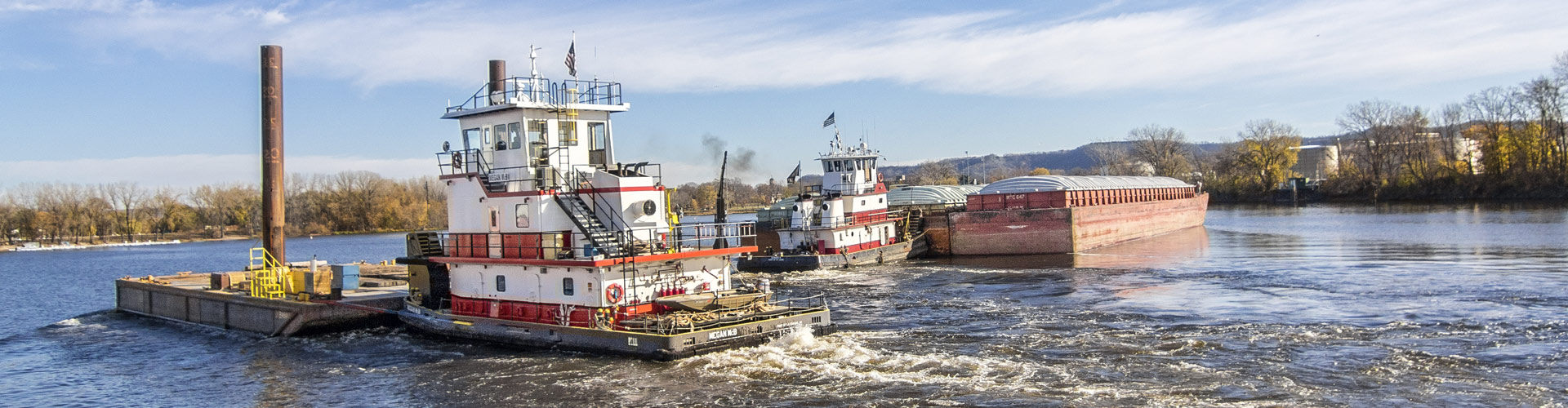 switching and fleeting, fleeting, barge transportation, inland waterway services, inland river services, inland river towing, towboats, Upper Mississippi river service, barge service, harbor management