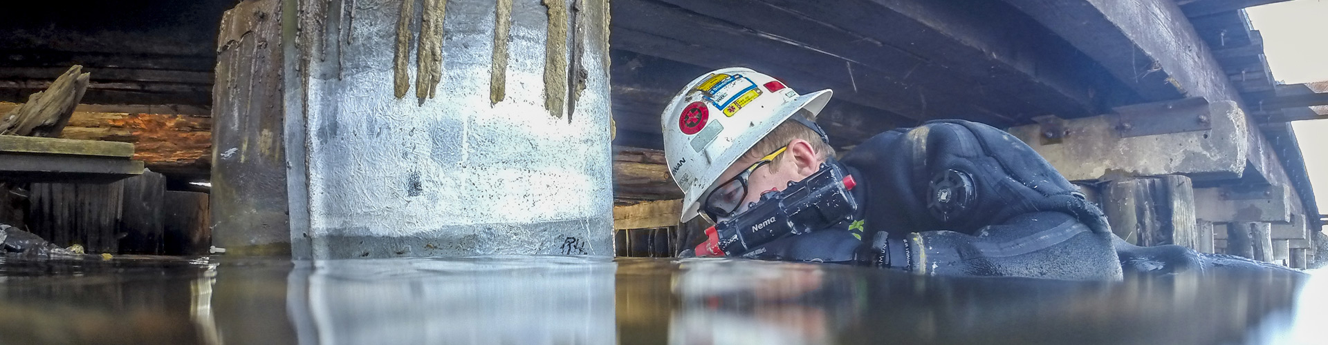 underwater construction, underwater pier repairs, bridge pier repairs, pier repairs, concrete repairs, pile jackets