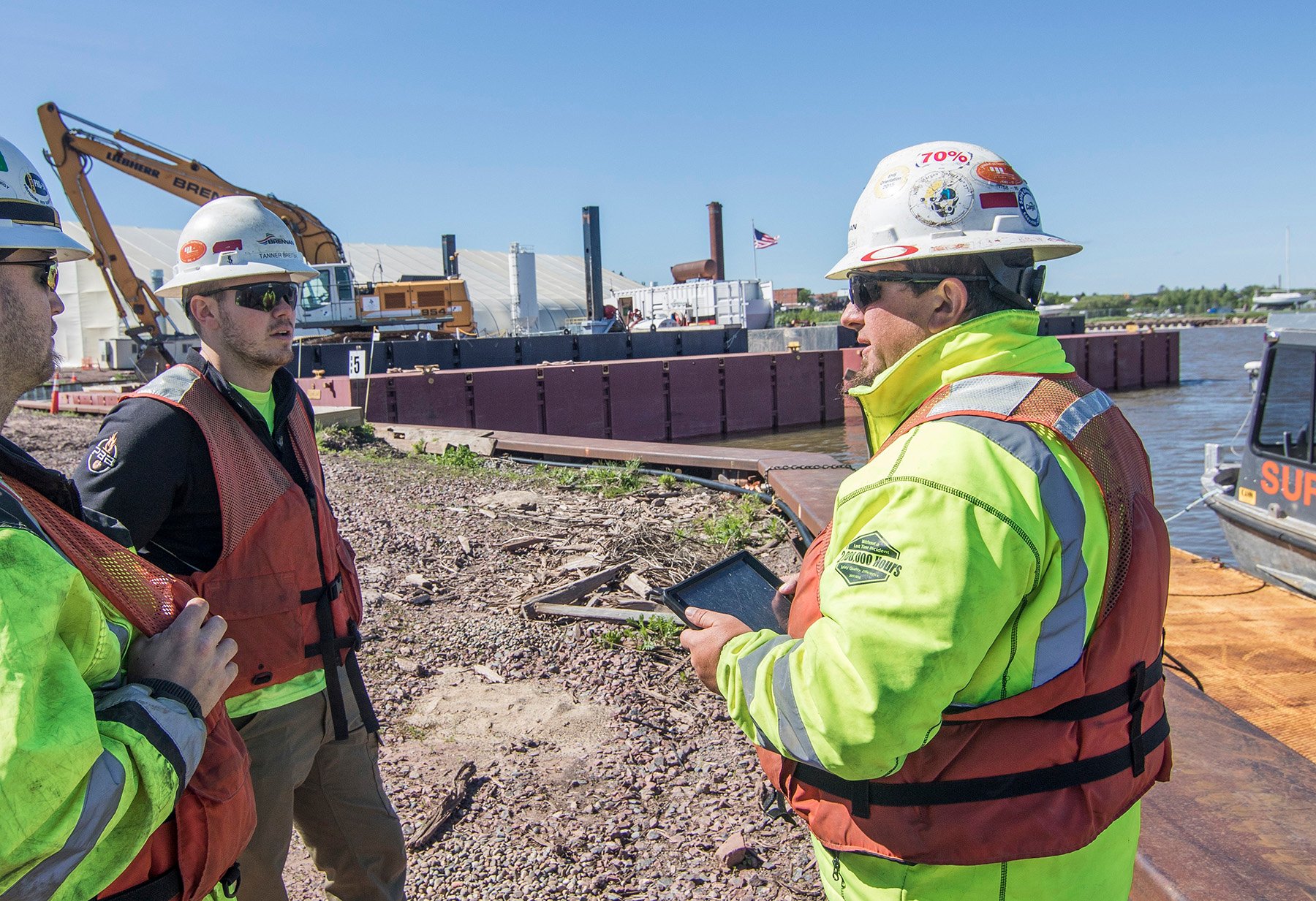 Safety meeting on site with tablet