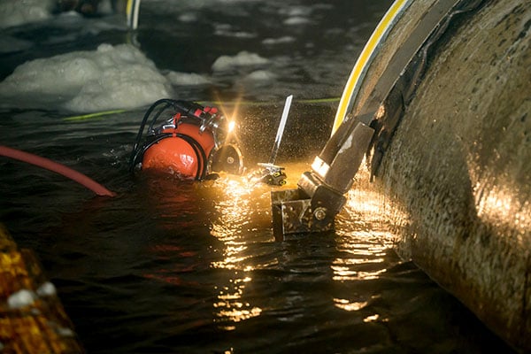 JF Brennan diver starting a complex dive to perform underwater testing. JF Brennan diver starting a complex dive to perform underwater testing.