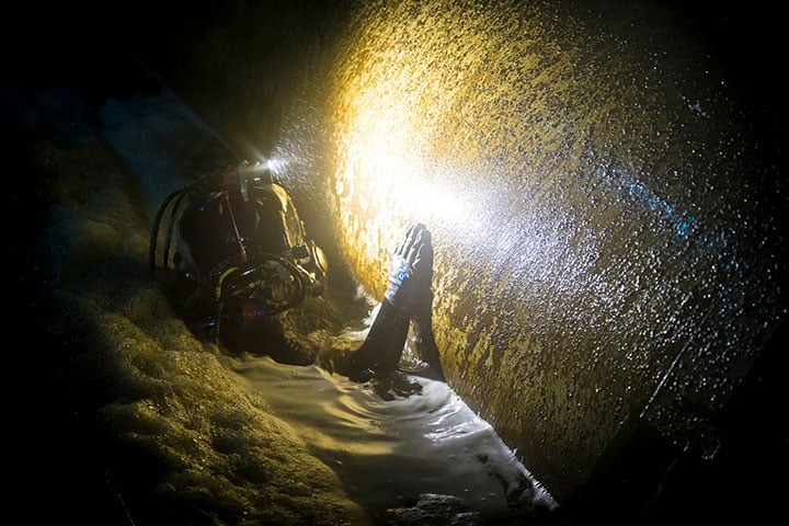 JF Brennan diver inspecting material and structures during a night dive. JF Brennan diver inspecting material and structures during a night dive.