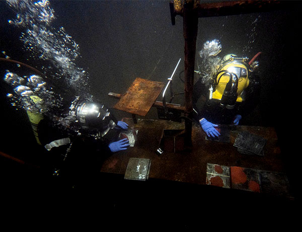 JF Brennan divers doing underwater testing and inspecting materials with different coatings. JF Brennan divers doing underwater testing and inspecting materials with different coatings.
