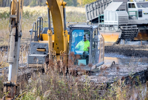 Environmental response, wetland restoration, amphibious dredging, railroad environmental response, train derailment cleanup, marsh cleanup, marsh restoration, wetland preservation